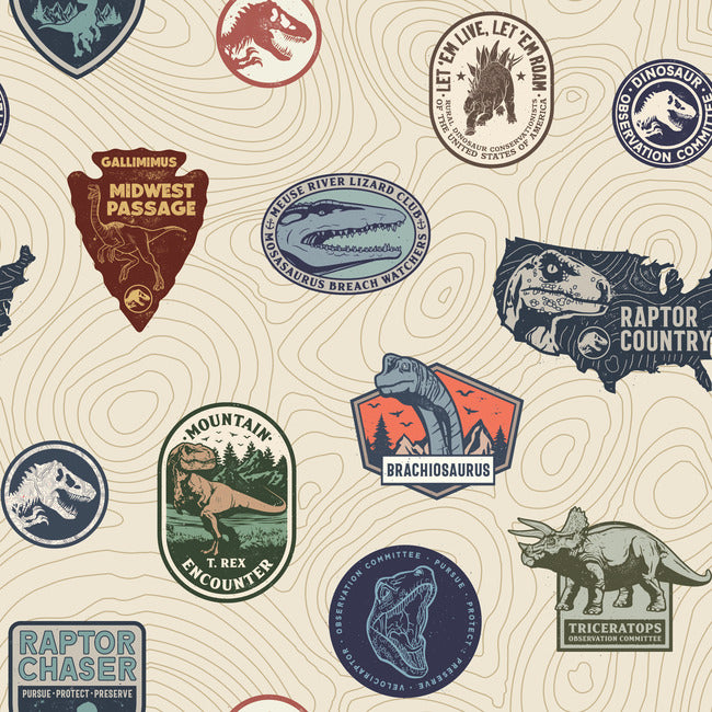 Jurassic World Badges Peel & Stick Wallpaper Peel and Stick Wallpaper RoomMates Roll Beige 